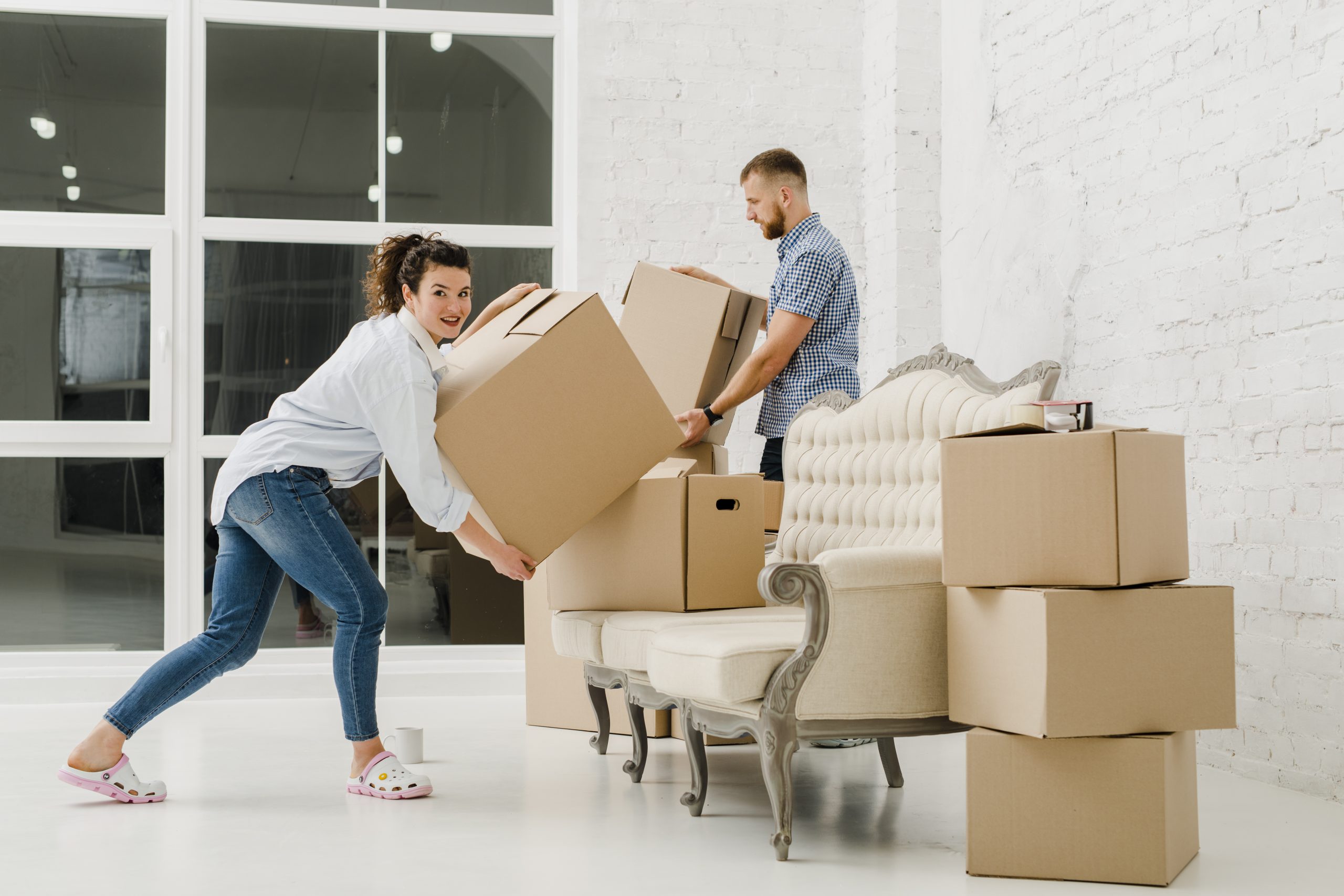 couple-sorting-carton-boxes couple-sorting-carton-boxes